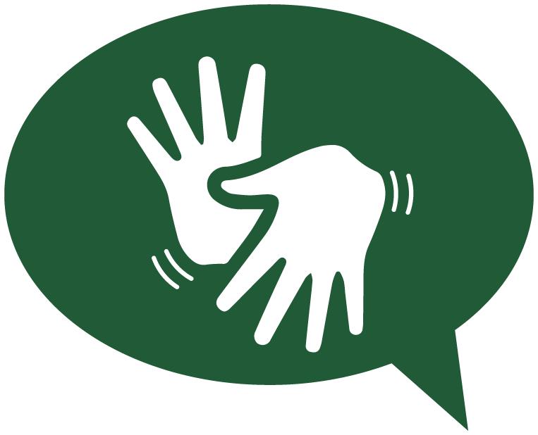 Em verde, pictograma da acessibilidade comunicacional: um balão de fala. No centro dele estão duas mãos sinalizam LIBRAS.